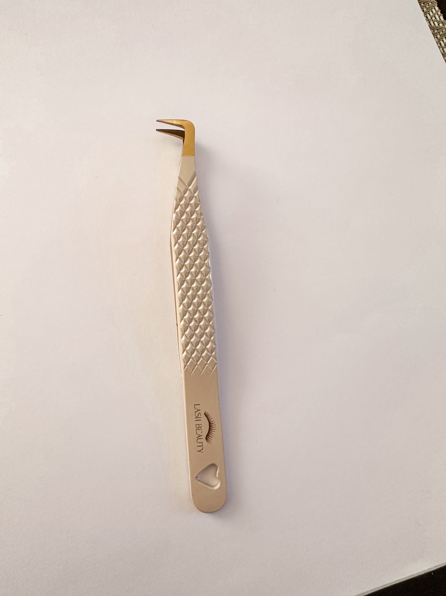 Fiber tip volume tweezer