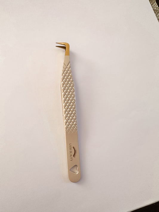 Fiber tip volume tweezer