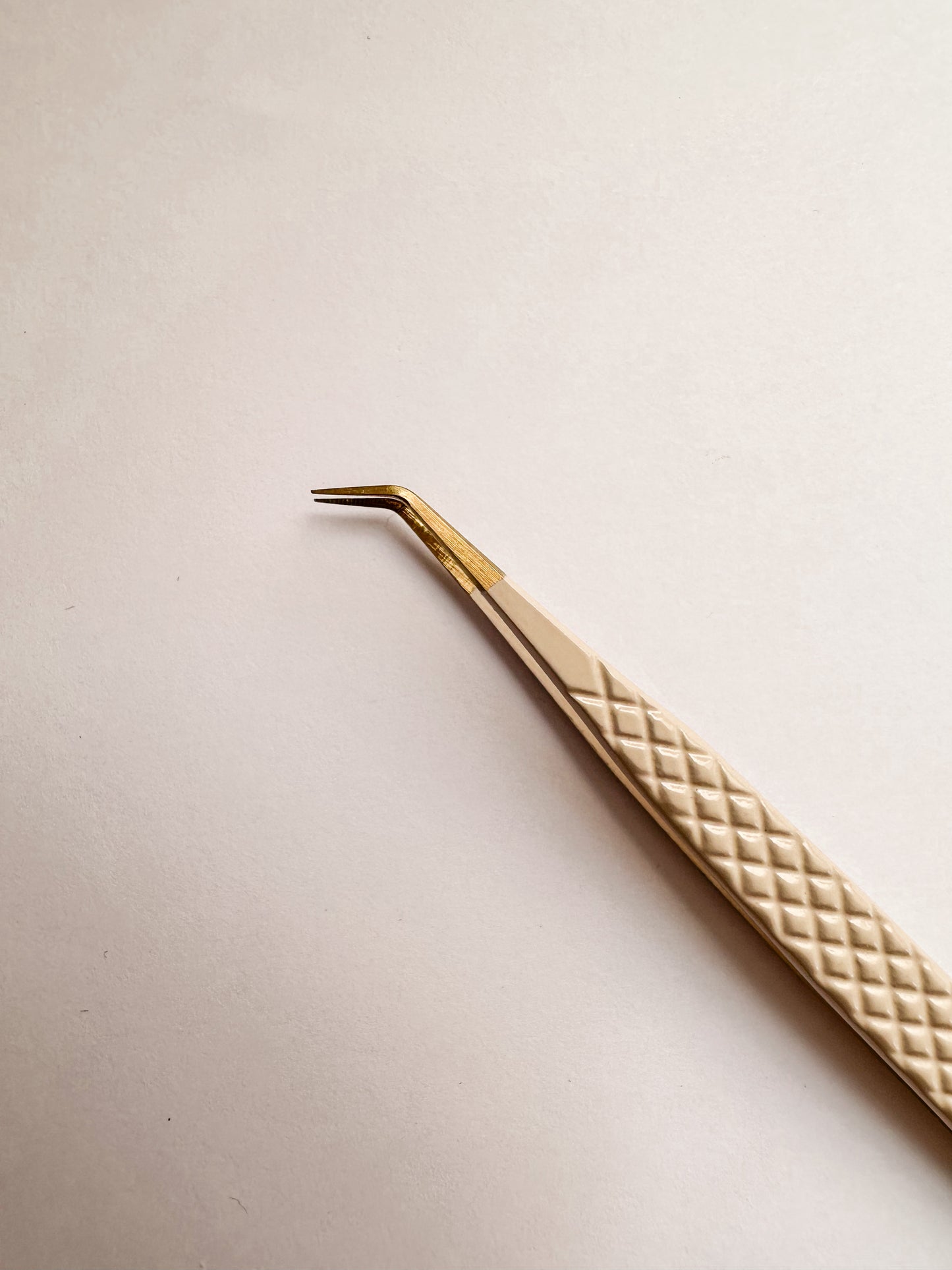 Isolation tweezer